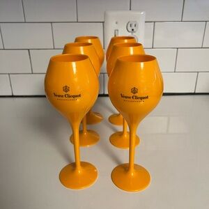 Set of 6 Plastic Veuve Clicquot champagne glasses.